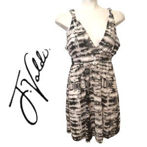 J Valdi size large silky plunging back and front twisted strap mini dress